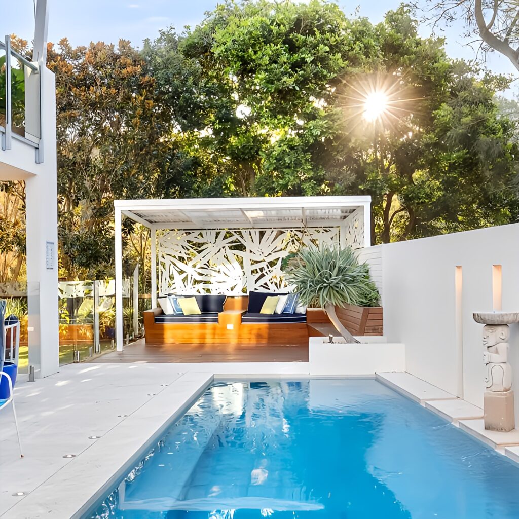 SOL-COAST-CONSTRUCTION-OUTDOOR-ENTERTAINING-AREA pool area. Sunset